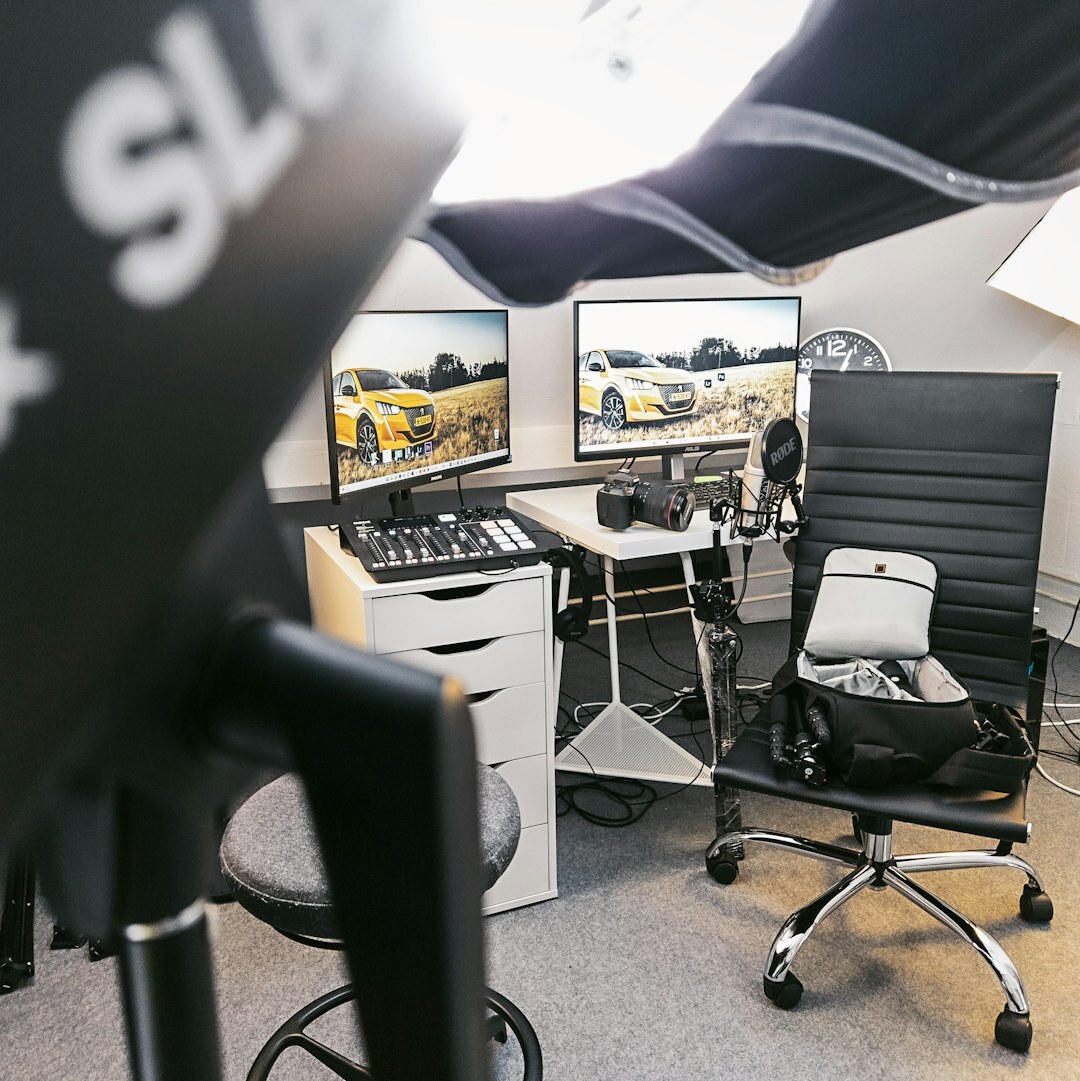 Video editor working on news footage in an editing suite